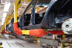 Automotive production line. Long format. Wide angle view of plant of automotive industry. Can be used as a banner