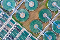 Water treatment solution, Industrial water treatment‎, Aerial top view recirculation solid contact clarifier sedimentation tank, Ecosystem and healthy environment concepts and background.