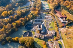 Bird's eye view of a small sewage treatment plant in the Taunus / Germany in autumn