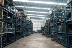 Car parts in old warehouses. Used vehicle part for recycling scrap, Automotive spare parts, Engine at storage warehouse, Recycle goods, metal