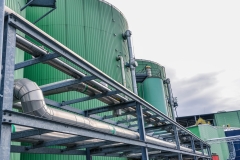 Part of a biogas plant. Wastes recycling ecology concept. Copy space.