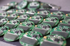 round electronic boards with display, microchip and processor, many meter components