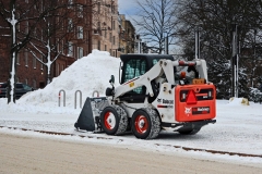 Bobcat Skid Steer Loader Snow Removal by in winter.