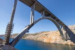Renewing corrosion damages on arch and pillars of concrete bridge Maslenica on A1 highway in Croatia