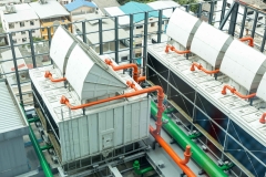 Chiller. Sets of cooling towers in data center building.
